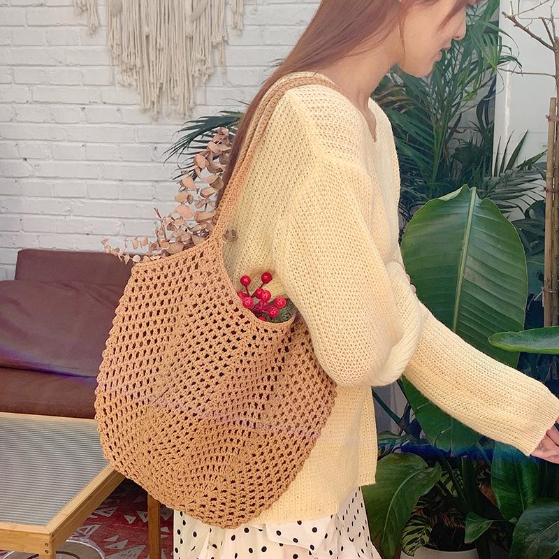 Casual large-capacity woven bag New hollow straw bag Lazy shoulder bag Vacation beach bag Women s bag 
Casual large-capacity woven bag New hollow straw bag Lazy shoulder bag Vacation beach bag Women s bag