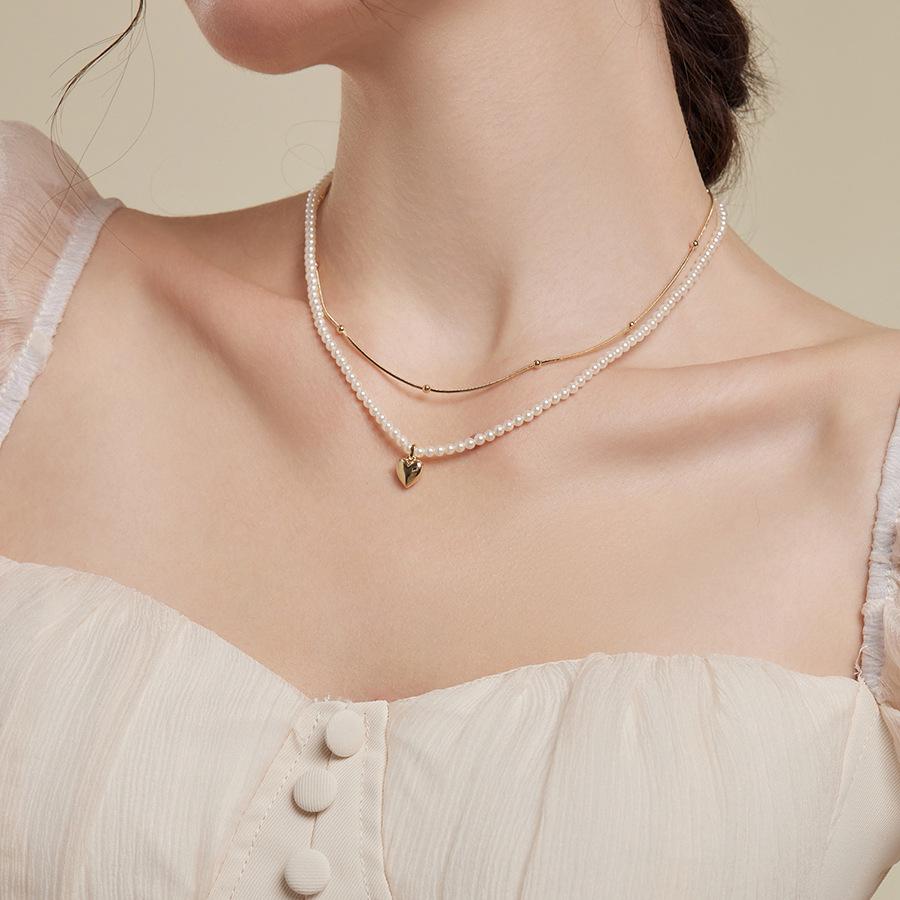 Double-Layer Heart Pearl Necklace, Light Luxury Layered Clavicle Chain with French High-End Heart Pendant Choker for Women. золотий/шампанського
Double-Layer Heart Pearl Necklace, Light Luxury Layered Clavicle Chain with French High-End Heart Pendant Choker for Women. золотий/шампанського