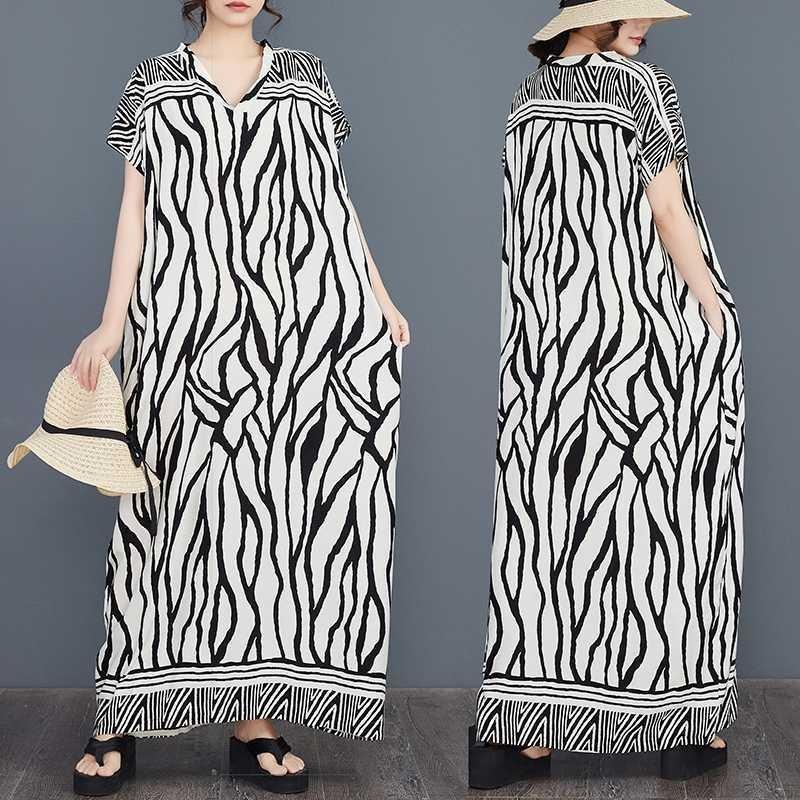 Boho Stripe Batwing Dress - Plus Size Flowy Rayon Caftan with V-Neck, Beach Cover Up & Loungewear one size fits all
Boho Stripe Batwing Dress - Plus Size Flowy Rayon Caftan with V-Neck, Beach Cover Up & Loungewear one size fits all