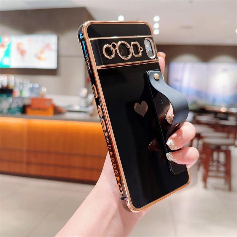 Чехол-подставка с ремешком на запястье Heart Soft Shell для Google Pixel 109 Pro XL/9A8A Google Pixel 10
Чехол-подставка с ремешком на запястье Heart Soft Shell для Google Pixel 109 Pro XL/9A8A Google Pixel 10