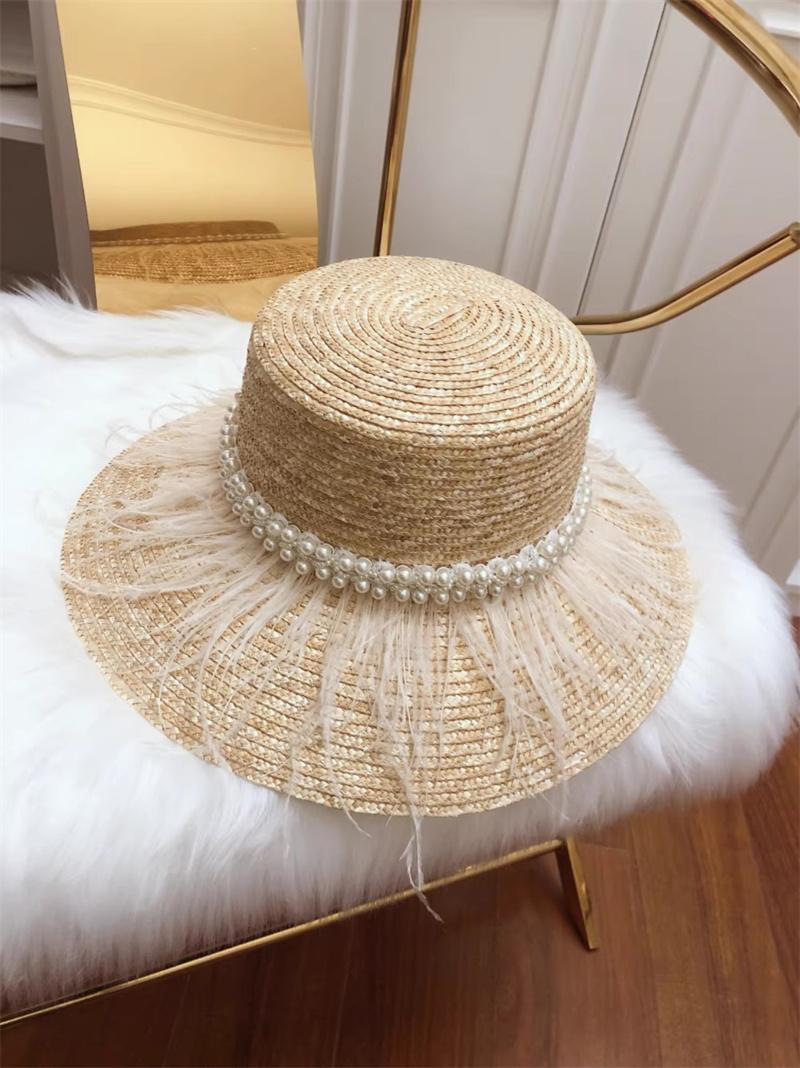 202601-nu ins chic summer handmade straw pearl ribbon feather decoration model show holiday lady beach cap leisure sun hat head size 57cm
202601-nu ins chic summer handmade straw pearl ribbon feather decoration model show holiday lady beach cap leisure sun hat head size 57cm