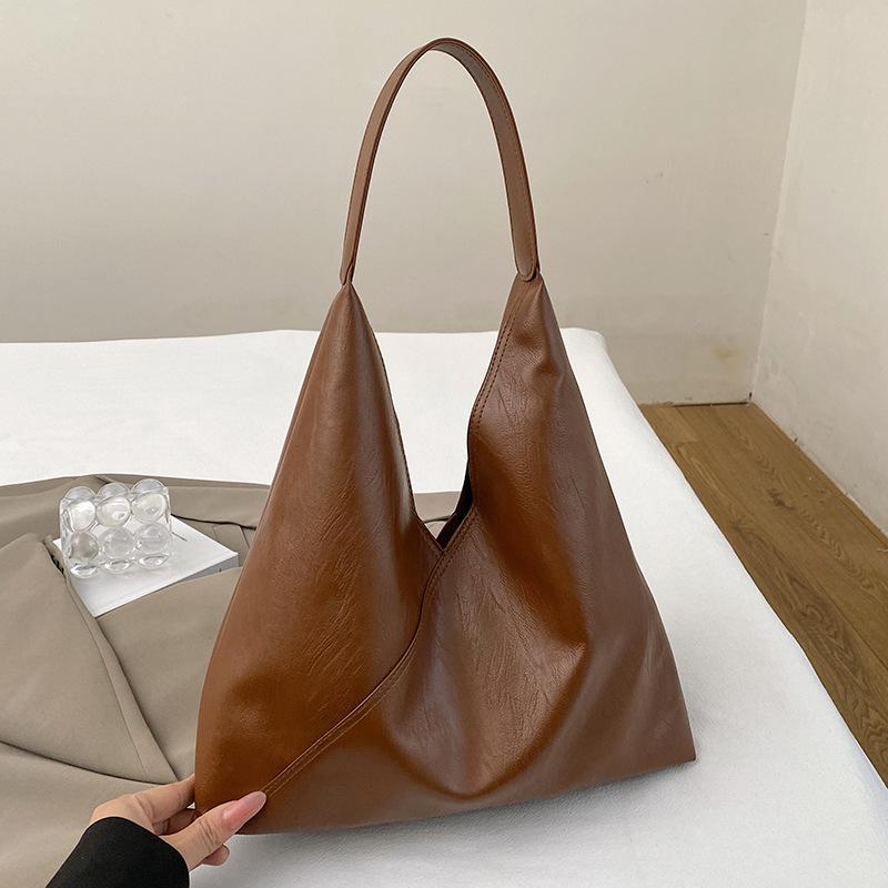 Soft leather retro bag women s new fashionable large-capacity shoulder underarm bag casual versatile commuter tote bag коричневий
Soft leather retro bag women s new fashionable large-capacity shoulder underarm bag casual versatile commuter tote bag коричневий