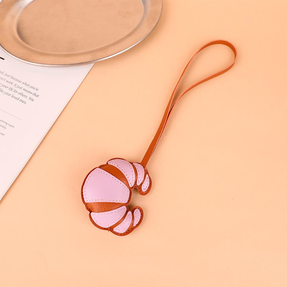 New PU Leather Croissant Bag Pendant: Handmade Multi-layer Patch Lanyard with Creative Bread Design
New PU Leather Croissant Bag Pendant: Handmade Multi-layer Patch Lanyard with Creative Bread Design