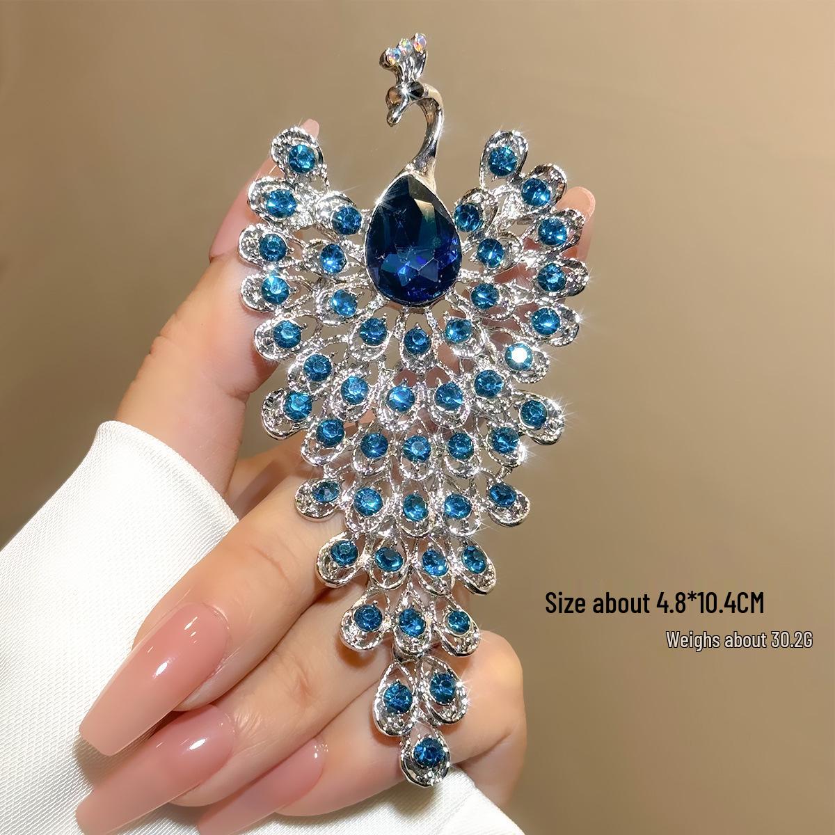 Брошка Фенікс Павич Сова: Елегантна жіноча шпилька-корсаж
Брошка Фенікс Павич Сова: Елегантна жіноча шпилька-корсаж