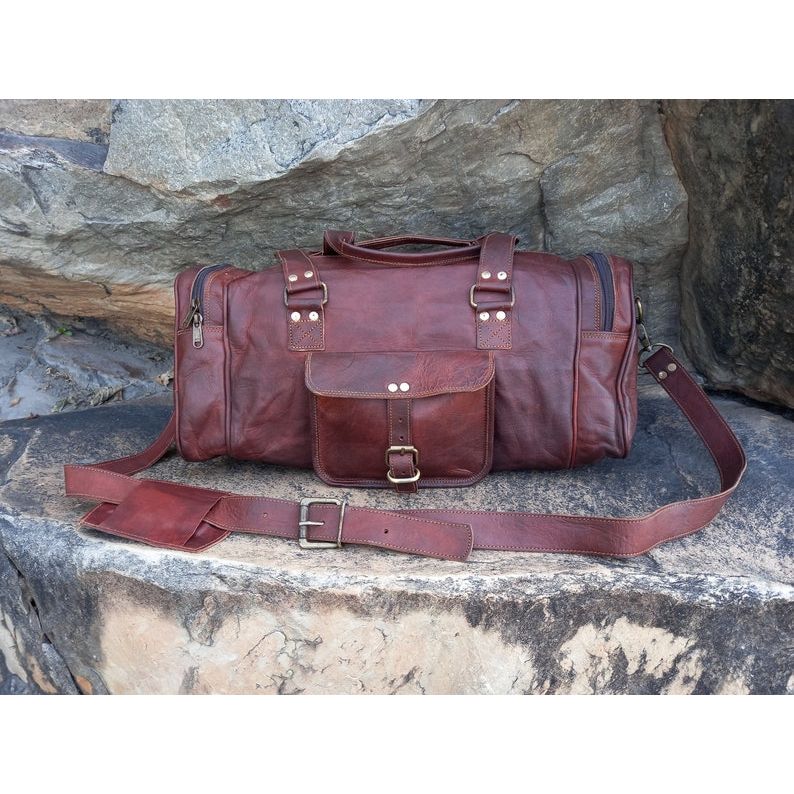 Handmade Leather Duffle Bag: Travel Weekender 20 x 9 x 9 in
Handmade Leather Duffle Bag: Travel Weekender 20 x 9 x 9 in