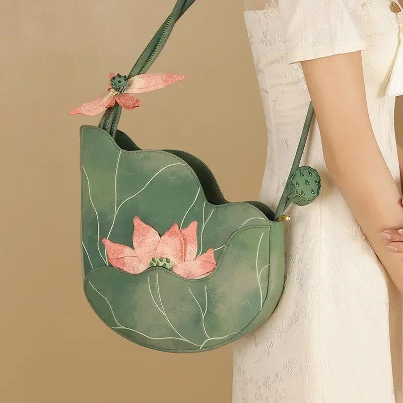 Elegant Chinese Style Lotus Leaf Floral Embroidery Shoulder Bag for Women Designer Handbag Fashionable Female Bag New Collection
Elegant Chinese Style Lotus Leaf Floral Embroidery Shoulder Bag for Women Designer Handbag Fashionable Female Bag New Collection