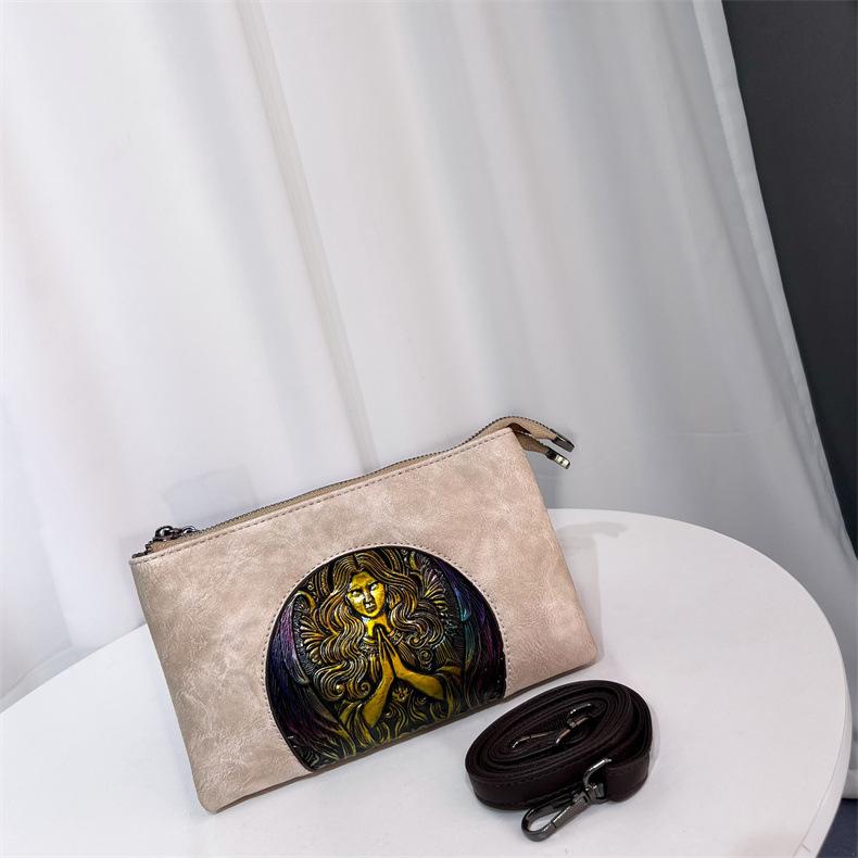 Этническая винтажная круглая сумка кроссбоди - Дамская сумка на плечо с ручным тиснением, минималистичная текстура, вместительная сумка для通勤
Этническая винтажная круглая сумка кроссбоди - Дамская сумка на плечо с ручным тиснением, минималистичная текстура, вместительная сумка для通勤