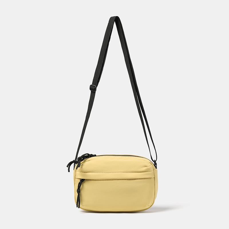 Вишукана мінімалістична жіноча нейлонова сумка через плече для монет - Легка, маленька сумка на плече в нішевому дизайні жовтий
Вишукана мінімалістична жіноча нейлонова сумка через плече для монет - Легка, маленька сумка на плече в нішевому дизайні жовтий