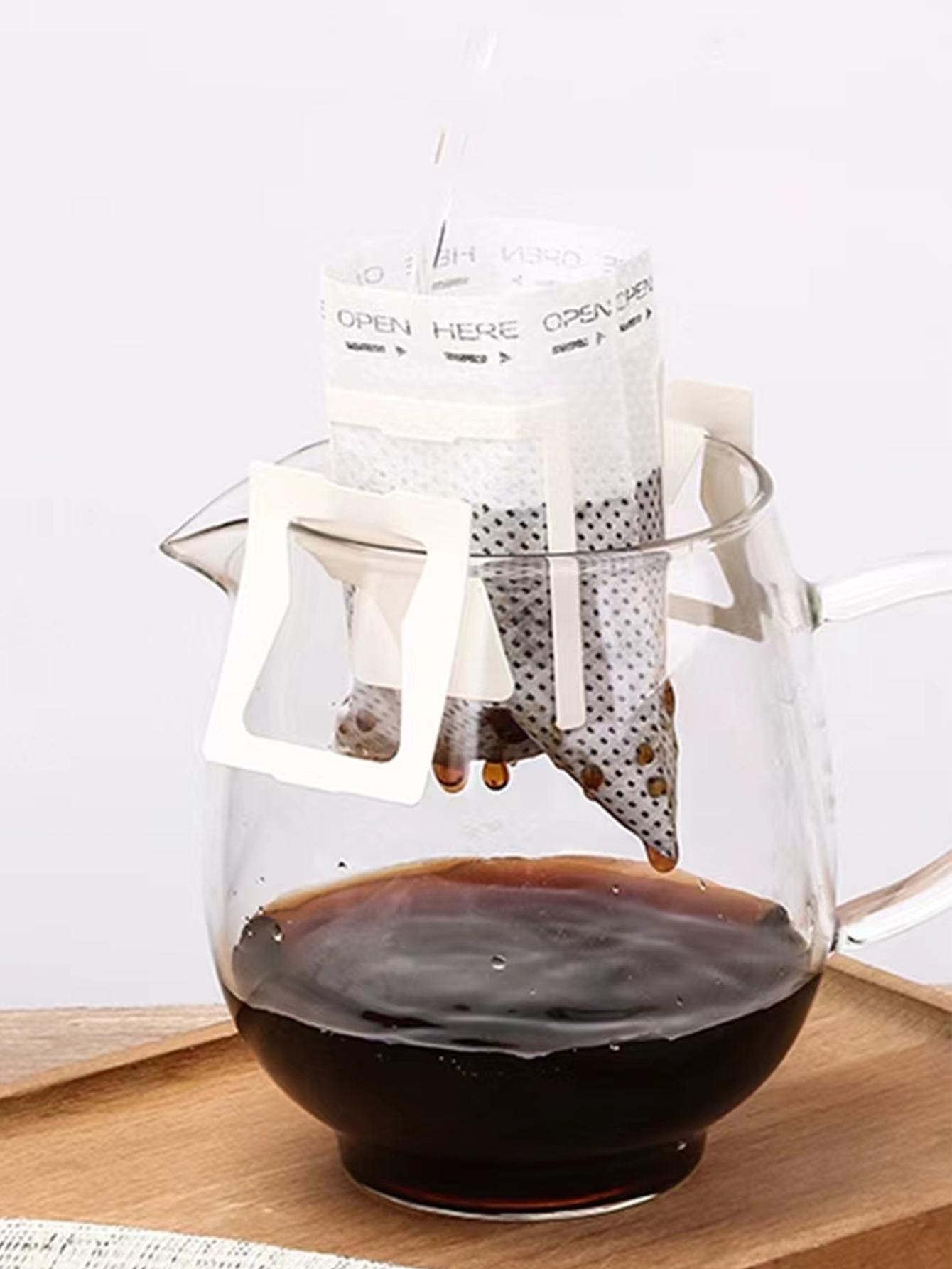 50 шт./Портативный пакет для кофе-фильтра - Одноразовый пакет для капельного кофе с ушками - для путешествий, кемпинга, дома, офиса, кухонные аксессуары
50 шт./Портативный пакет для кофе-фильтра - Одноразовый пакет для капельного кофе с ушками - для путешествий, кемпинга, дома, офиса, кухонные аксессуары