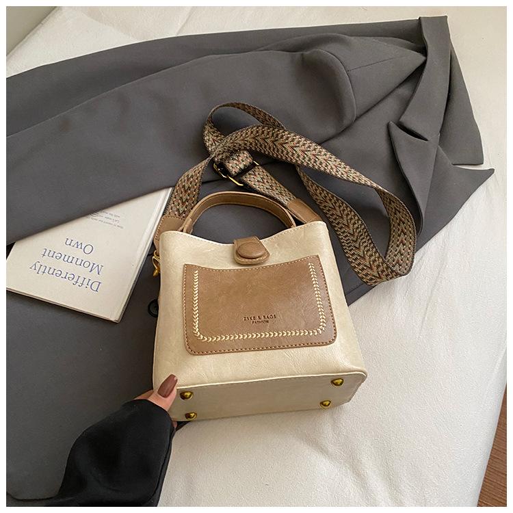 Осень и зима ретро нишевая текстура большая вместимость сумка женская 2025 новая мода лоскутная на одно плечо кроссбоди сумка-ведро