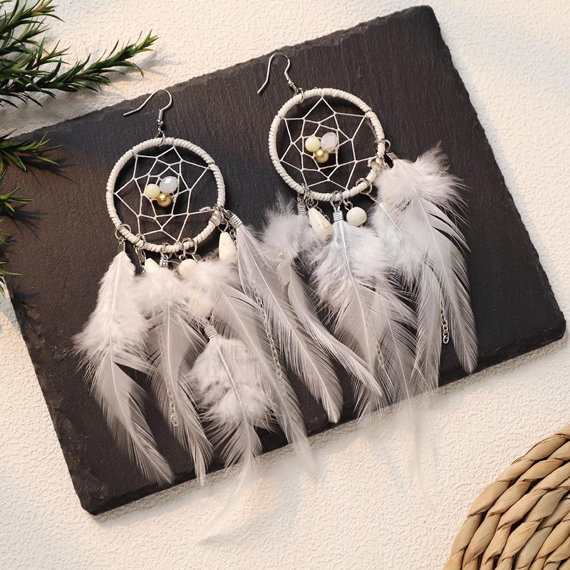 Bohemian dream catcher feather earrings long tassel exaggerated personality seaside vacation style earrings women
Bohemian dream catcher feather earrings long tassel exaggerated personality seaside vacation style earrings women