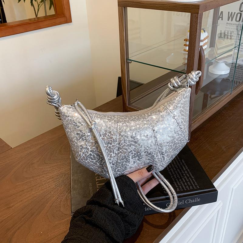 Personalized croissant 2025 spring and summer new Korean version of fashion niche shoulder bag women s sequined crossbody dumpling bag чорний
Personalized croissant 2025 spring and summer new Korean version of fashion niche shoulder bag women s sequined crossbody dumpling bag чорний