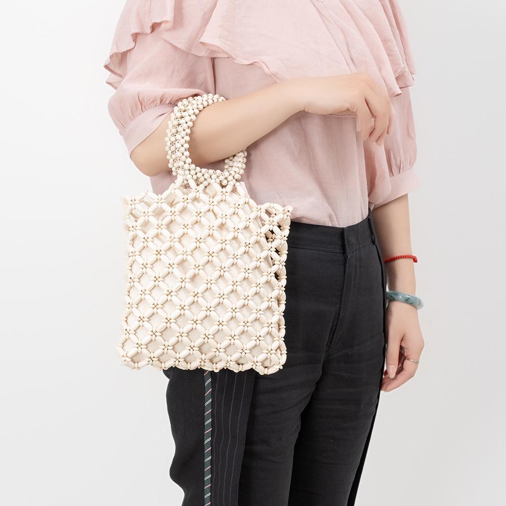 Сумка ENSPT Multicolor Wooden Bead Woven Handbag - Универсальный летний дизайн для женщин 34 x 3 x 23 CM
Сумка ENSPT Multicolor Wooden Bead Woven Handbag - Универсальный летний дизайн для женщин 34 x 3 x 23 CM