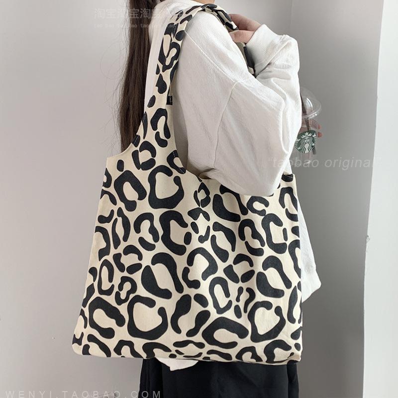 Korean Style Canvas Shoulder Bag for Women: Large Capacity, Student Class, Lazy Style Handbag
Korean Style Canvas Shoulder Bag for Women: Large Capacity, Student Class, Lazy Style Handbag