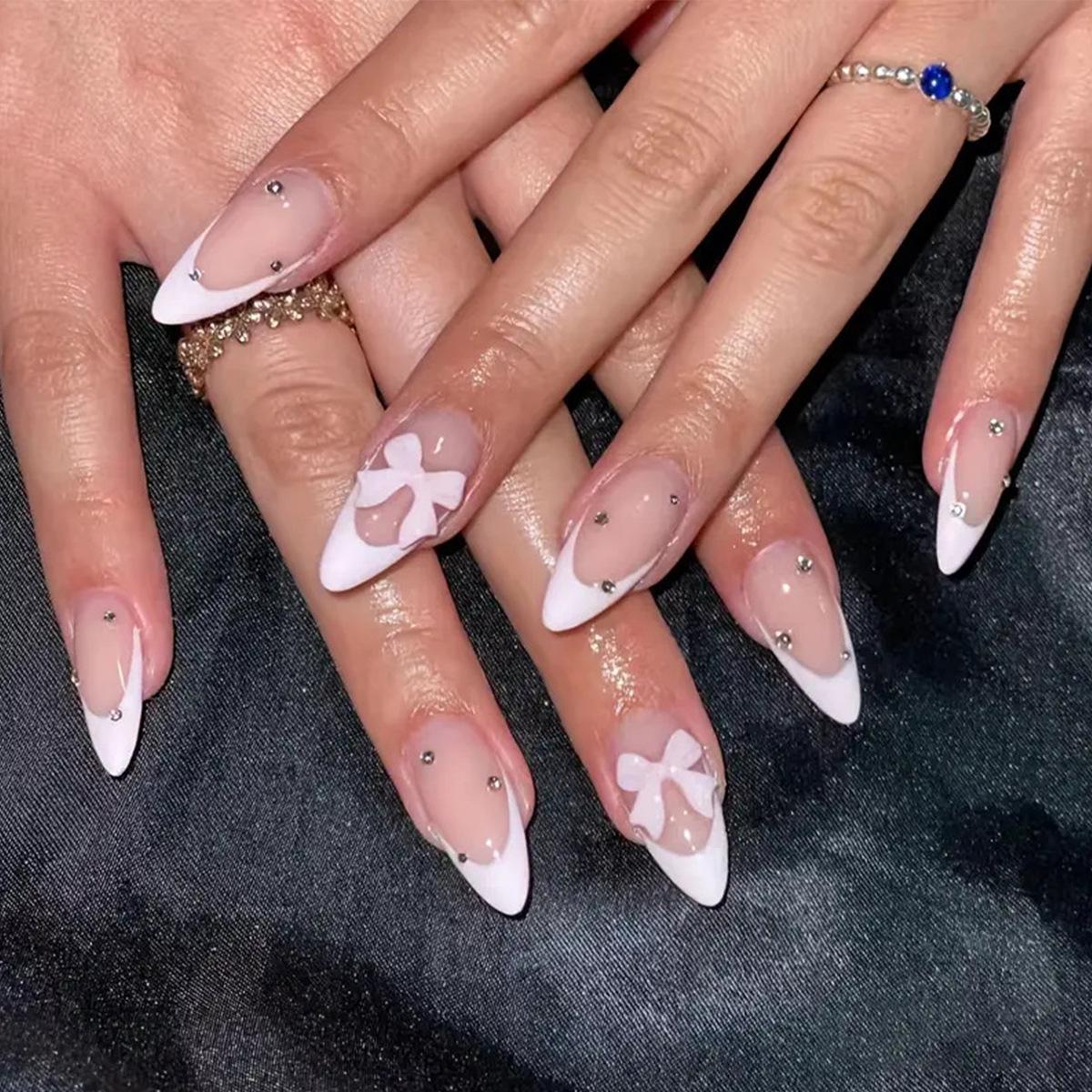 Almond Shape White French Nails with Bow and Rhinestone Decoration - Removable Fake Nail Art Patches
Almond Shape White French Nails with Bow and Rhinestone Decoration - Removable Fake Nail Art Patches