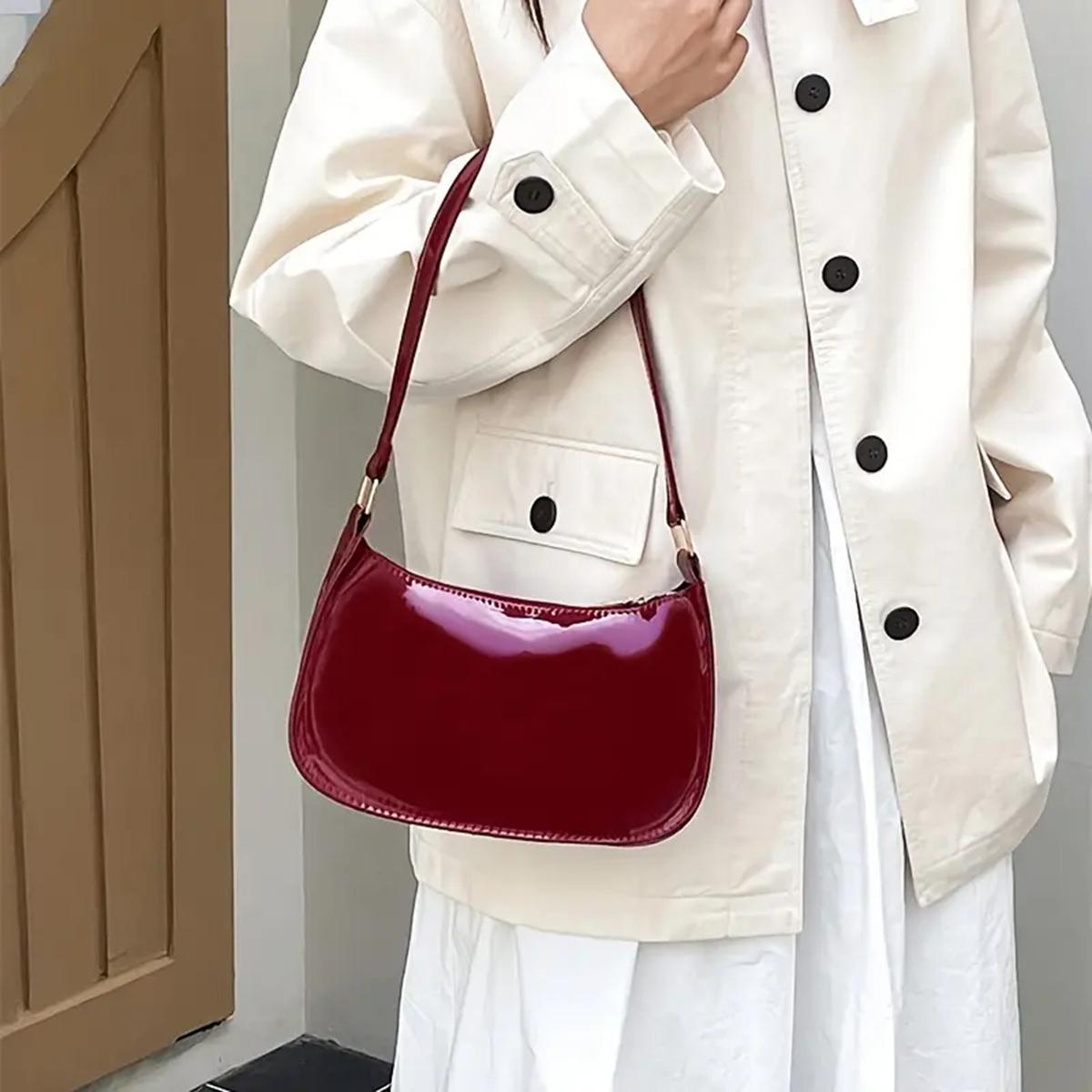Red high-end bag for women, retro hand-held underarm bag, foreign-style small patent leather bag for young girls, single shoulde червоний
Red high-end bag for women, retro hand-held underarm bag, foreign-style small patent leather bag for young girls, single shoulde червоний