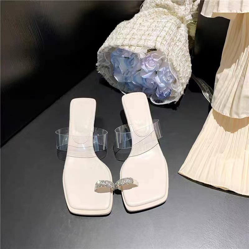 Open-toed slippers women s 2025 summer wear rhinestones transparent word belt temperament with skirt stiletto high heels 34
Open-toed slippers women s 2025 summer wear rhinestones transparent word belt temperament with skirt stiletto high heels 34
