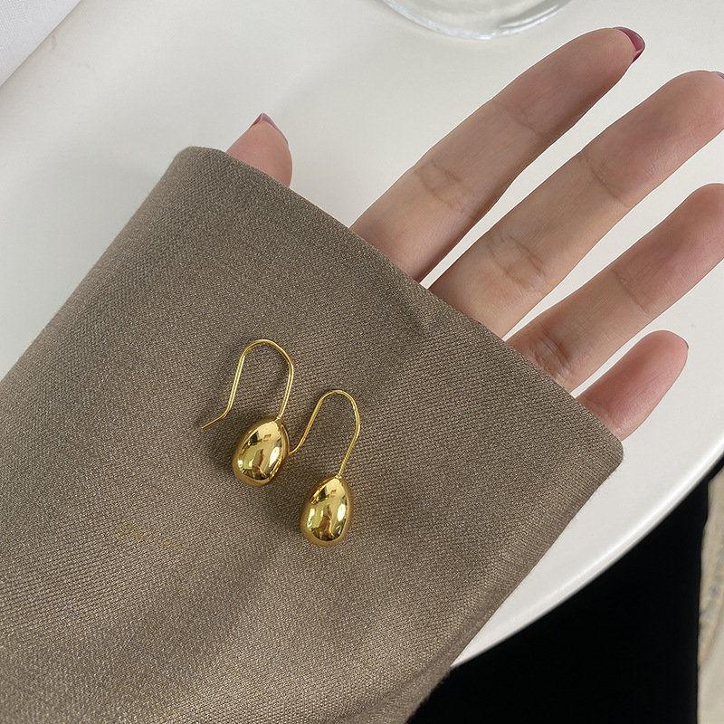 ANENJERY Глянцевые полые серьги-крючки в форме капли воды для женщин во французском стиле, простые универсальные ювелирные аксессуары, pendientes mujer
ANENJERY Глянцевые полые серьги-крючки в форме капли воды для женщин во французском стиле, простые универсальные ювелирные аксессуары, pendientes mujer