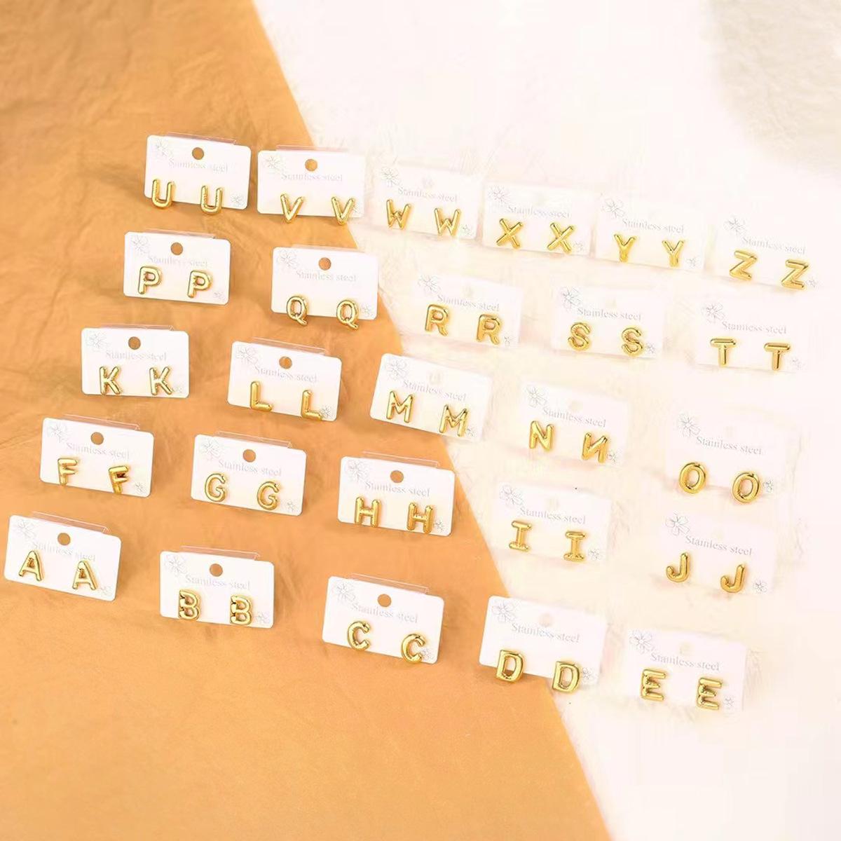 Gold-Plated Titanium Steel Stud Earrings with European & American 26 Letters Design
Gold-Plated Titanium Steel Stud Earrings with European & American 26 Letters Design