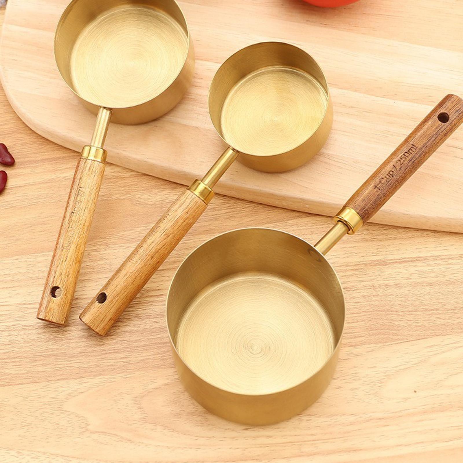 Stainless Steel Measuring Cups Set with Acacia Wood Handles 4 Piece Set Baking Tools Measuring Cups for Kitchen Use Durable and Practical one size золотий
Stainless Steel Measuring Cups Set with Acacia Wood Handles 4 Piece Set Baking Tools Measuring Cups for Kitchen Use Durable and Practical one size золотий
