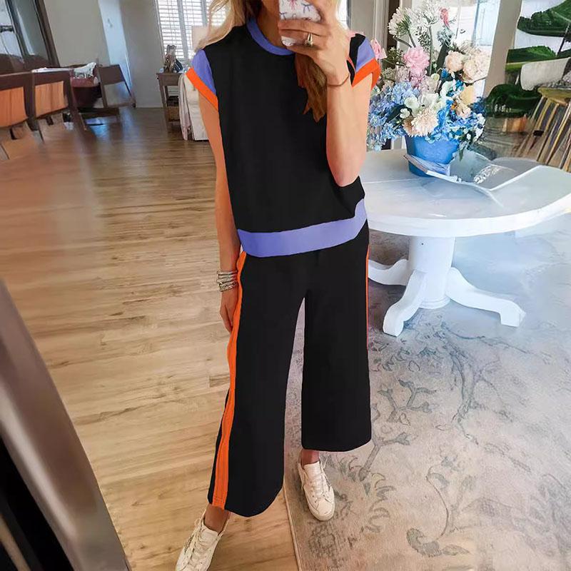 Women s 2 Piece Lounge Sets Casual Short Sleeve Pullover Tops Matching Wide Leg Pants Tracksuit Set S чорний
Women s 2 Piece Lounge Sets Casual Short Sleeve Pullover Tops Matching Wide Leg Pants Tracksuit Set S чорний
