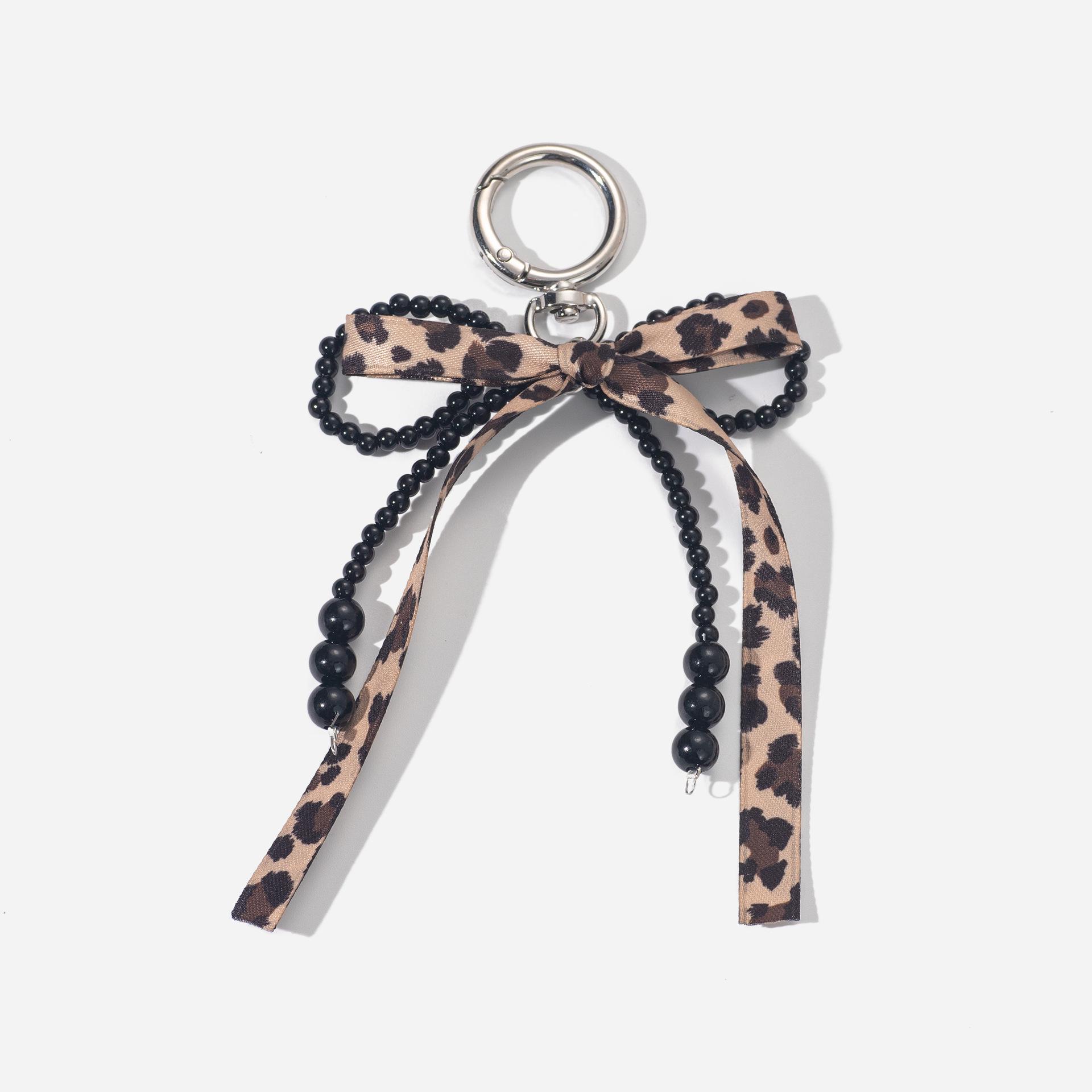 Leopard Bow Print Pendant Bag Charm with Beaded Keychain
Leopard Bow Print Pendant Bag Charm with Beaded Keychain