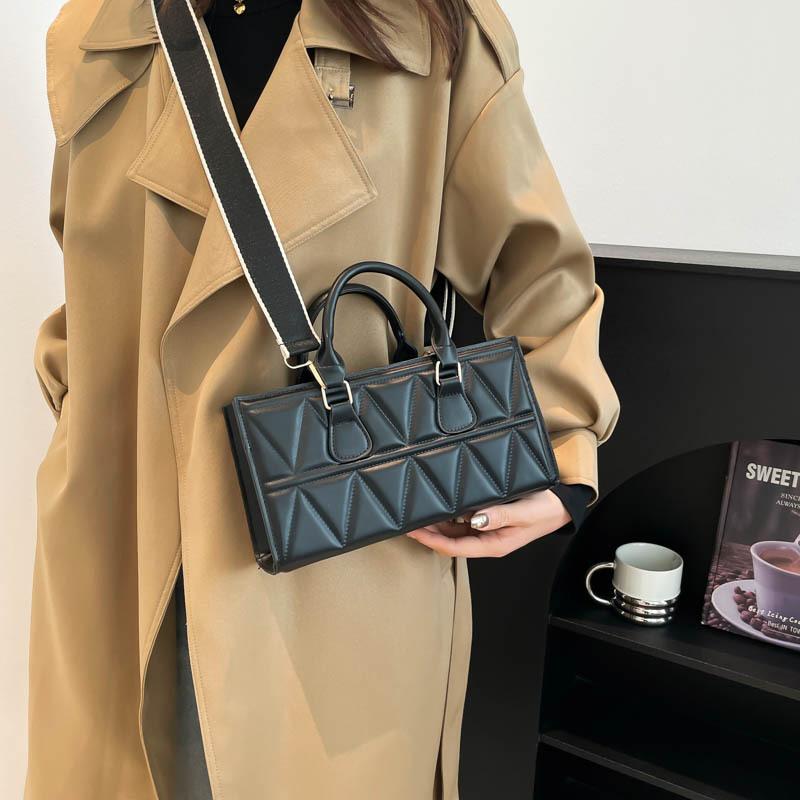 Large capacity triangle new texture indentation solid color retro simple messenger portable shoulder bag women
Large capacity triangle new texture indentation solid color retro simple messenger portable shoulder bag women
