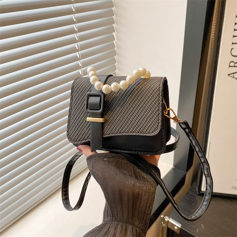 Summer new beautiful exquisite pearl portable mini bag solid color shoulder messenger bag small square bag women чёрный
Summer new beautiful exquisite pearl portable mini bag solid color shoulder messenger bag small square bag women чёрный