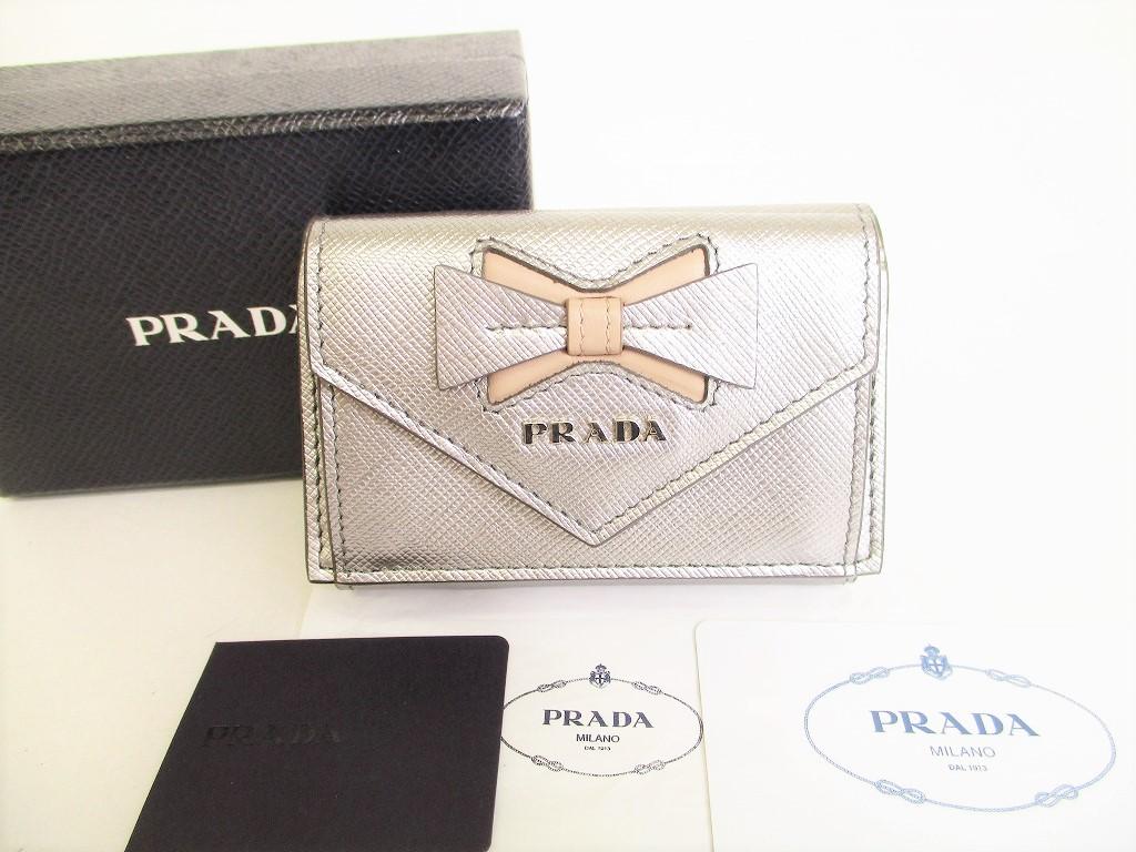 Authentic PRADA Ribbon Silver Saffiano Leather Trifold Wallet Compact Wallet #8714 Refurbished
Authentic PRADA Ribbon Silver Saffiano Leather Trifold Wallet Compact Wallet #8714 Refurbished