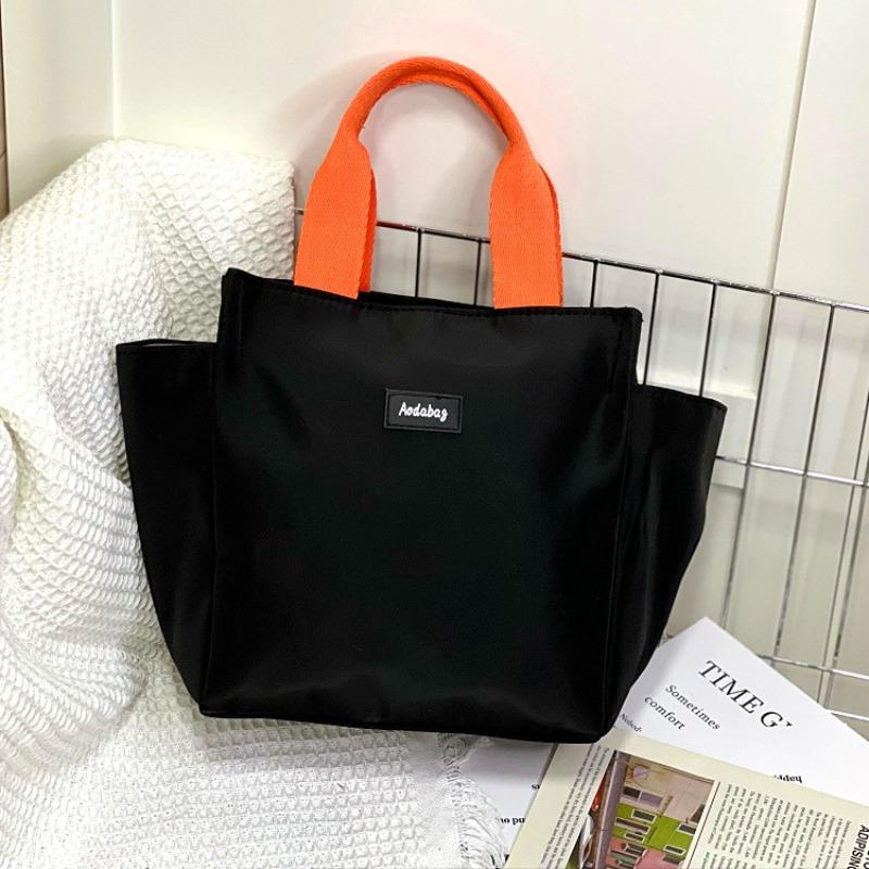 New niche collision color ribbon water cup umbrella position portable lunch box bag bento bag work hand bag чёрный
New niche collision color ribbon water cup umbrella position portable lunch box bag bento bag work hand bag чёрный