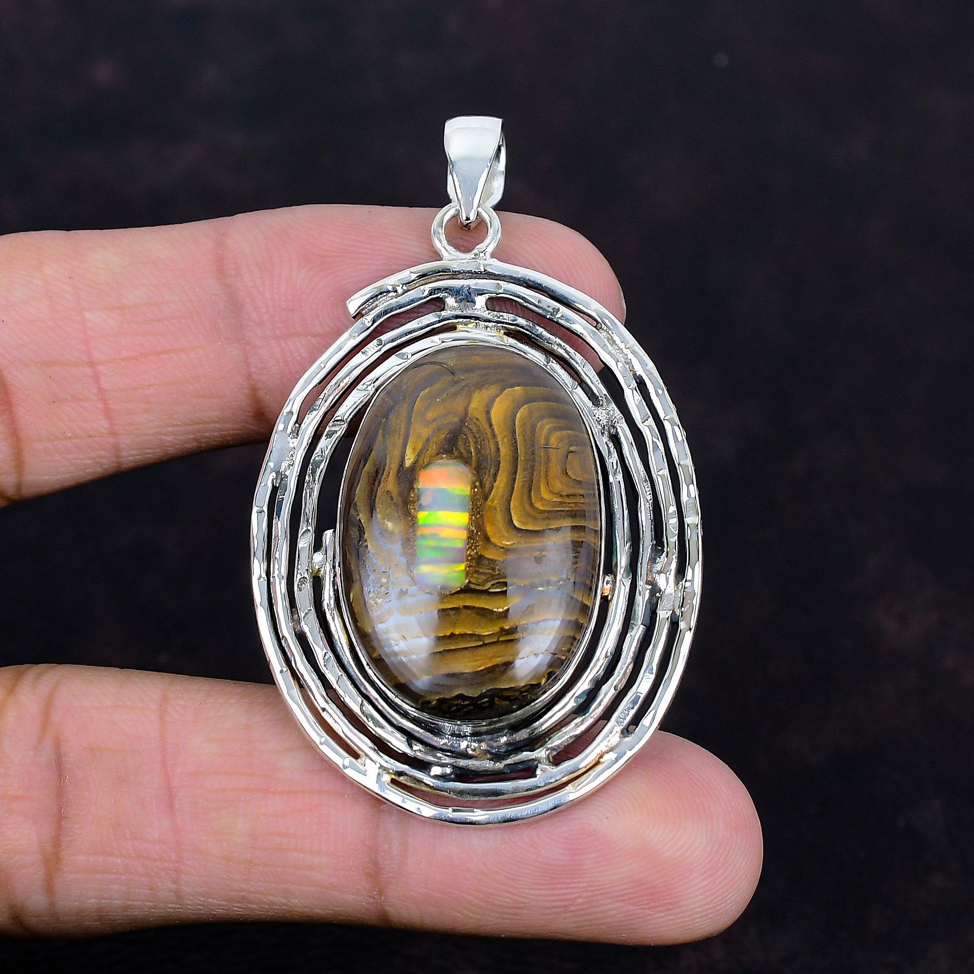 Ethopian opal in boulder opal pendant 925 sterling silver pendant brand new jewelry gemstone pendant handmade silver jewelry gifts for him
Ethopian opal in boulder opal pendant 925 sterling silver pendant brand new jewelry gemstone pendant handmade silver jewelry gifts for him