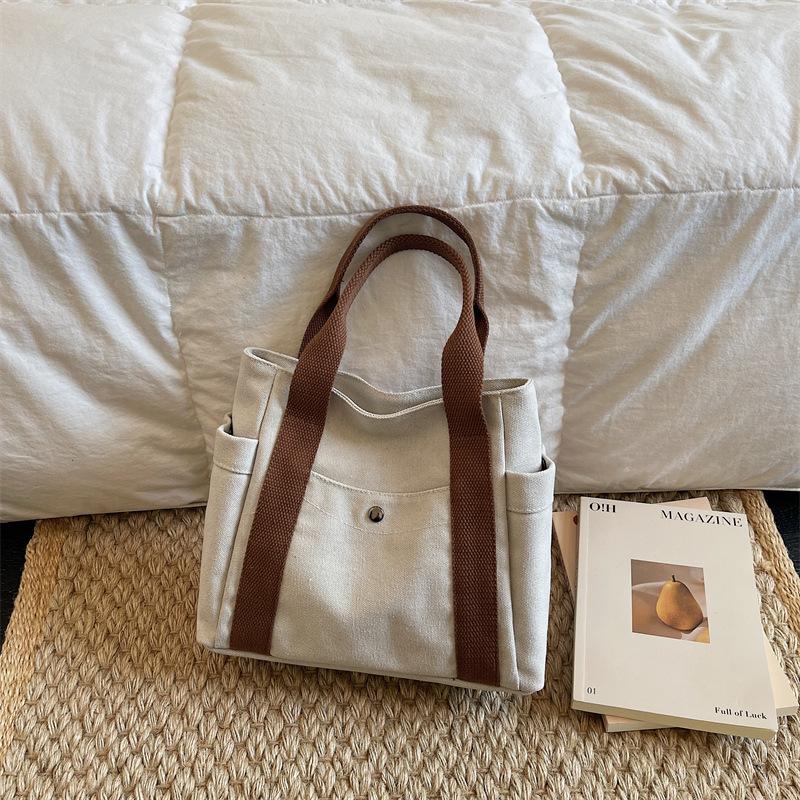 New Winter Vintage Canvas Top Handle Bag Women Fashi Multi Pocket Shoulder Bag Comfortable and Versatile Texture Storage Bag
New Winter Vintage Canvas Top Handle Bag Women Fashi Multi Pocket Shoulder Bag Comfortable and Versatile Texture Storage Bag