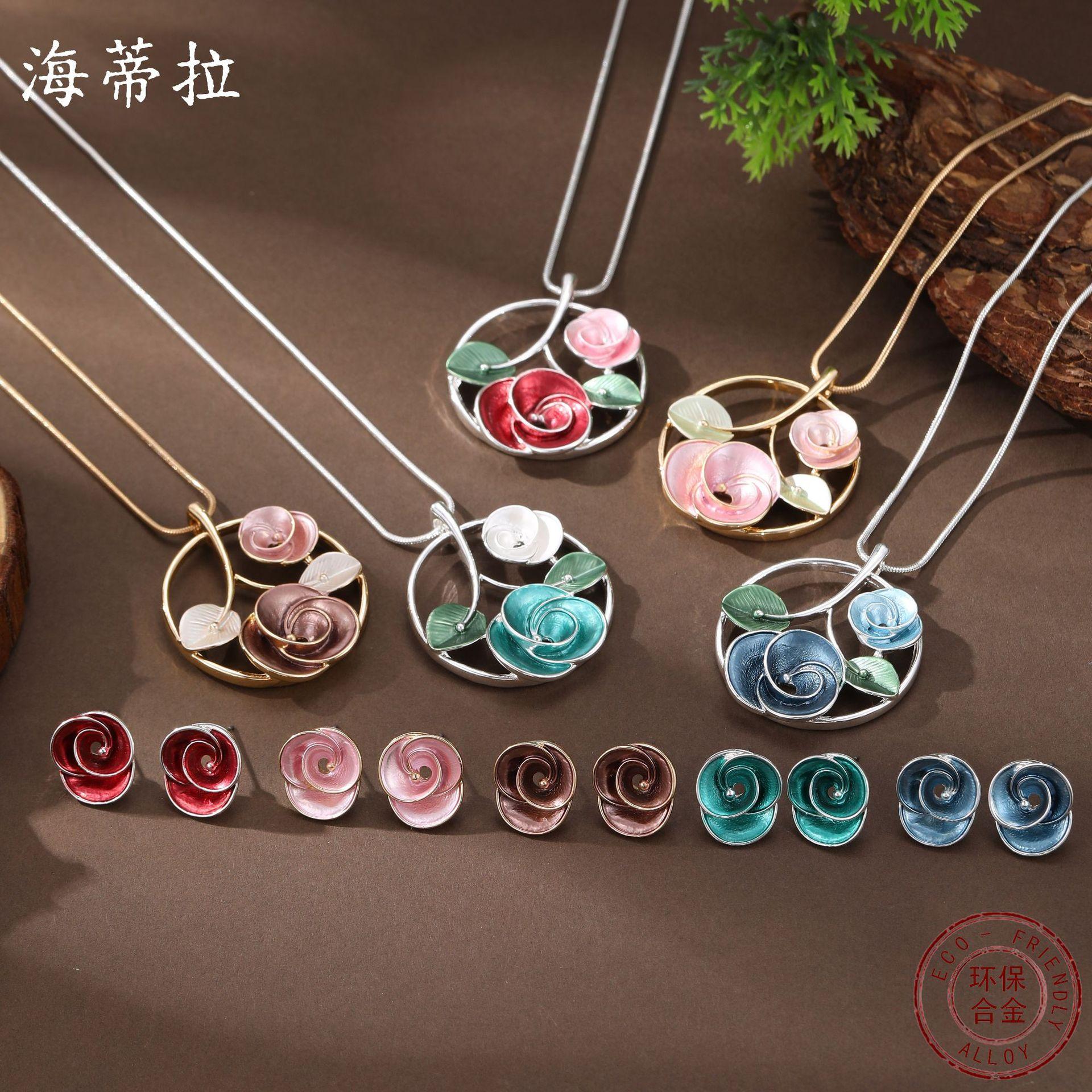 New enamel color hollow geometric rose stud earrings pendant set women s fashion rose necklace
New enamel color hollow geometric rose stud earrings pendant set women s fashion rose necklace
