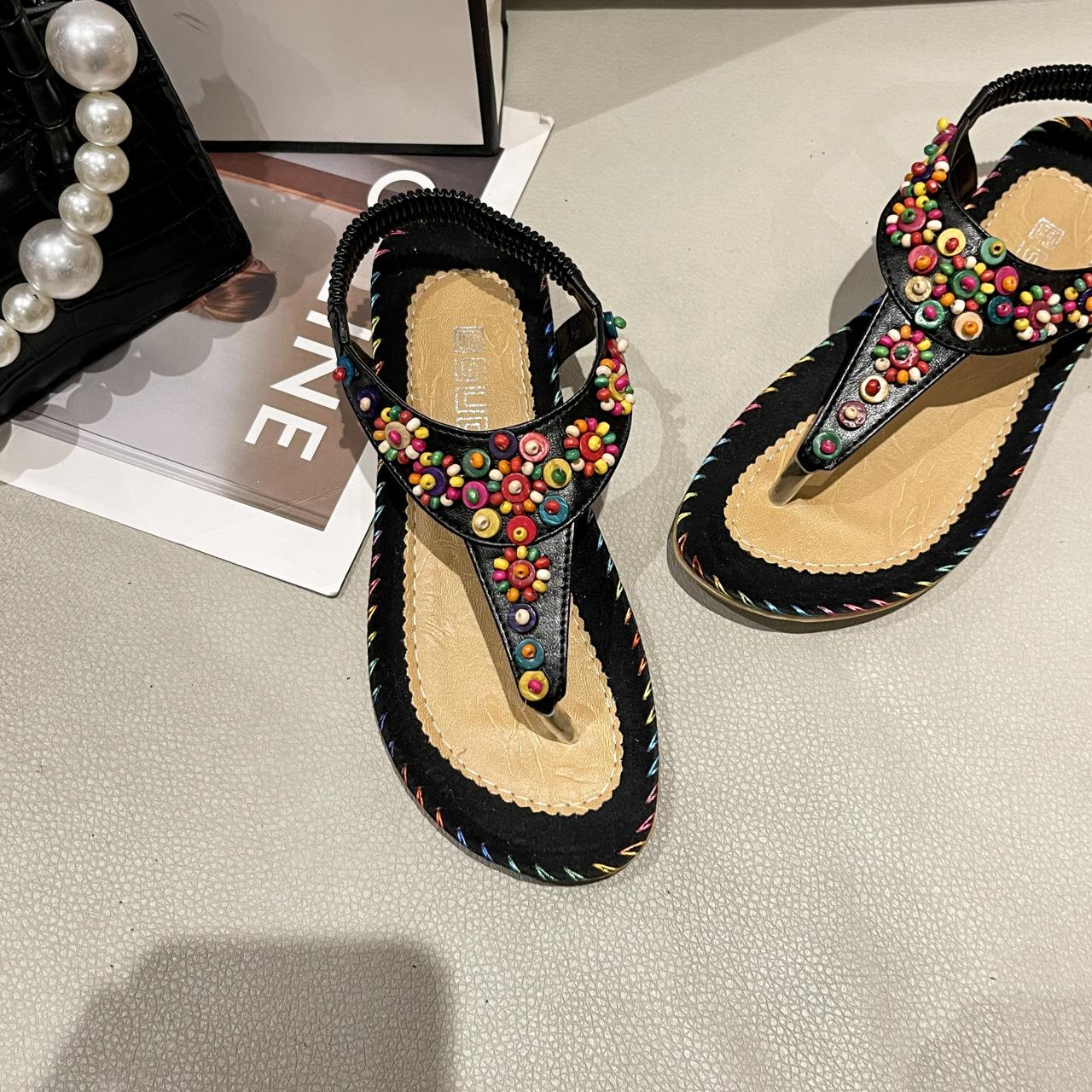 Босоніжки жіночі 2025 нове жіноче взуття богемні шльопанці жіночі бісерні пляжні сандалі жіночі 43 чорний
Босоніжки жіночі 2025 нове жіноче взуття богемні шльопанці жіночі бісерні пляжні сандалі жіночі 43 чорний