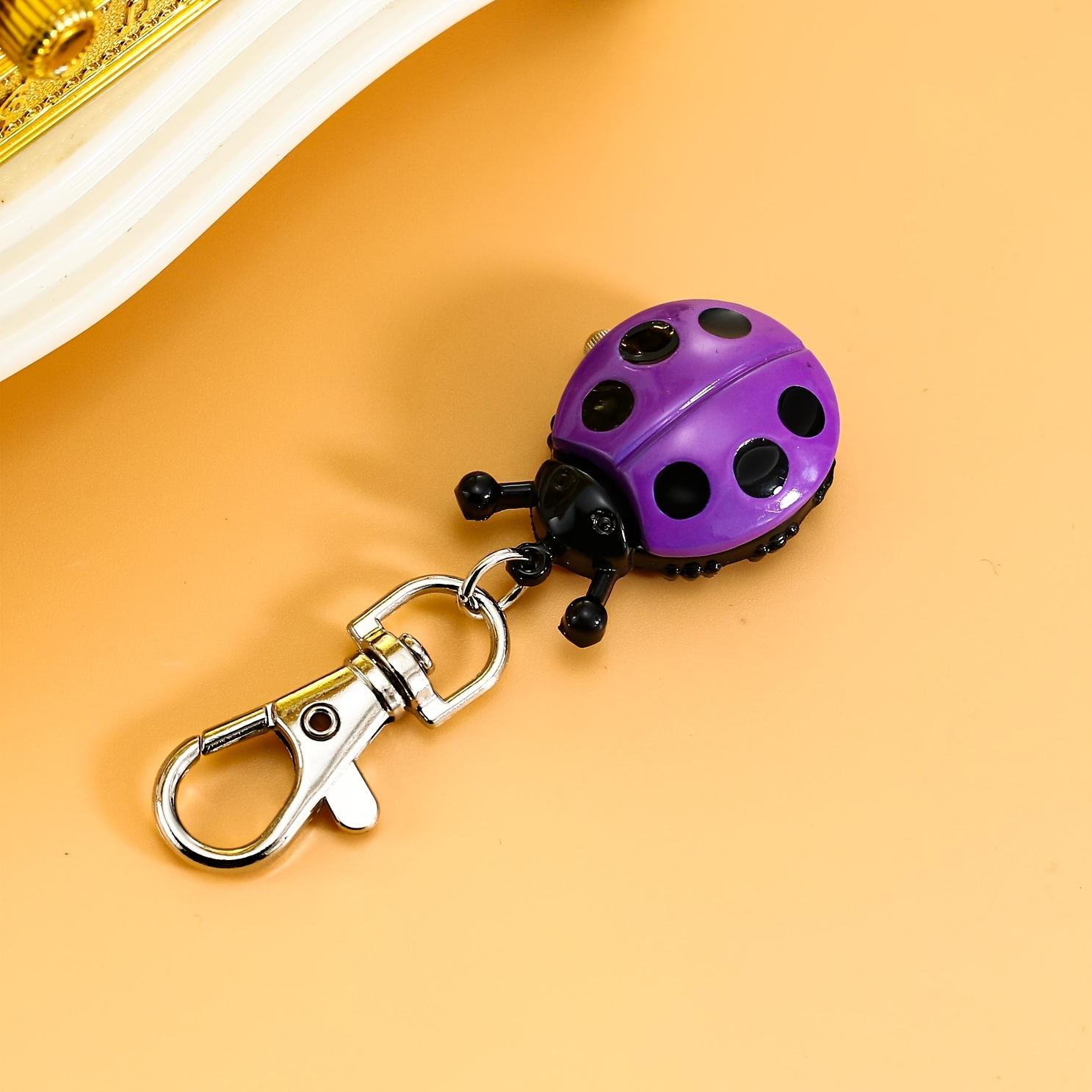 New Colorful Seven Star Ladybug Keychain Watch Wall Watch Fashion Trend Pocket Watch Multiple Colors Flip up Wall Watch Gift фіолетовий
New Colorful Seven Star Ladybug Keychain Watch Wall Watch Fashion Trend Pocket Watch Multiple Colors Flip up Wall Watch Gift фіолетовий