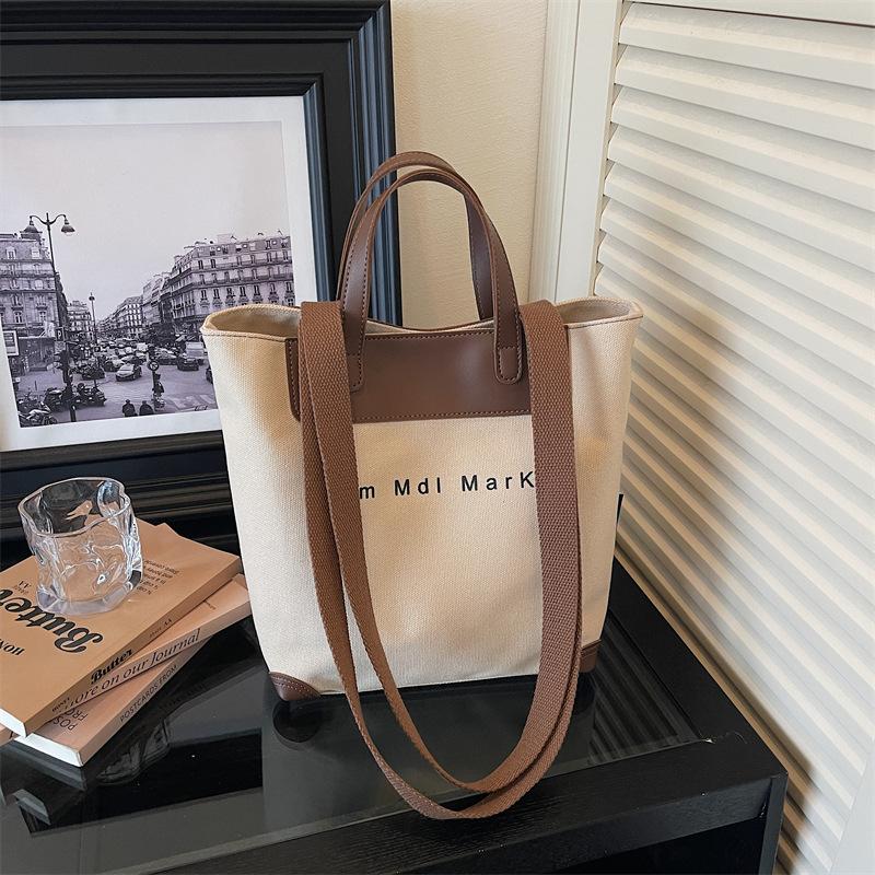 New Fashi Canvas Casual and Simple Tote Bag Women Large Capacity Shoulder Bag Fashiable and Versatile Commuting Shopping Bag
New Fashi Canvas Casual and Simple Tote Bag Women Large Capacity Shoulder Bag Fashiable and Versatile Commuting Shopping Bag