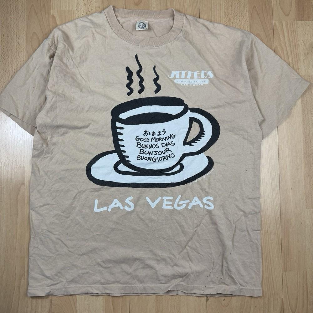 Vintage 90s Distressed Graphic T Shirt Jitters Gourmet Coffee in Las Vegas Unisex T-Shirt M
Vintage 90s Distressed Graphic T Shirt Jitters Gourmet Coffee in Las Vegas Unisex T-Shirt M