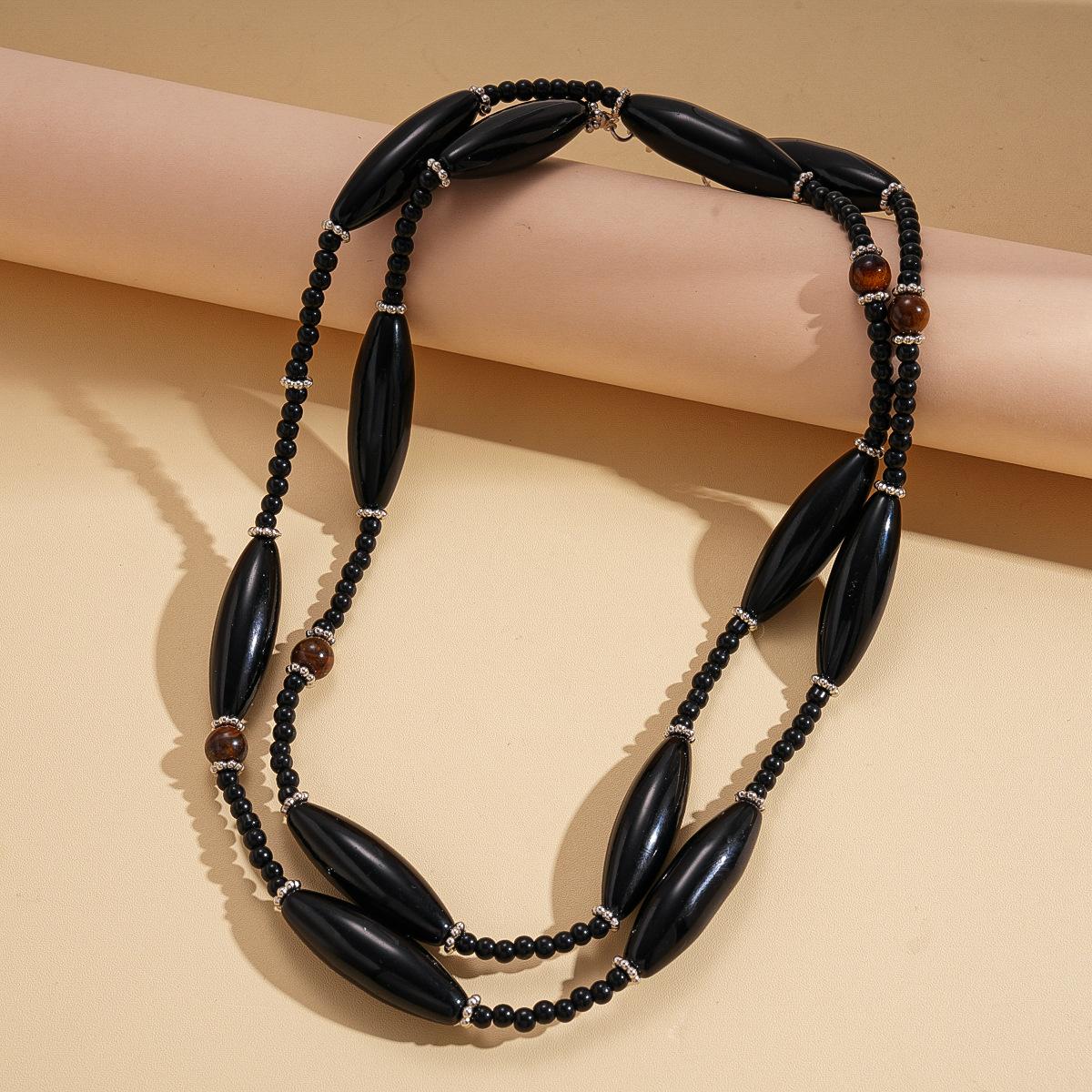 Tiger s eye crystal geometric beaded long stacked sweater chain dark wind retro necklace
Tiger s eye crystal geometric beaded long stacked sweater chain dark wind retro necklace