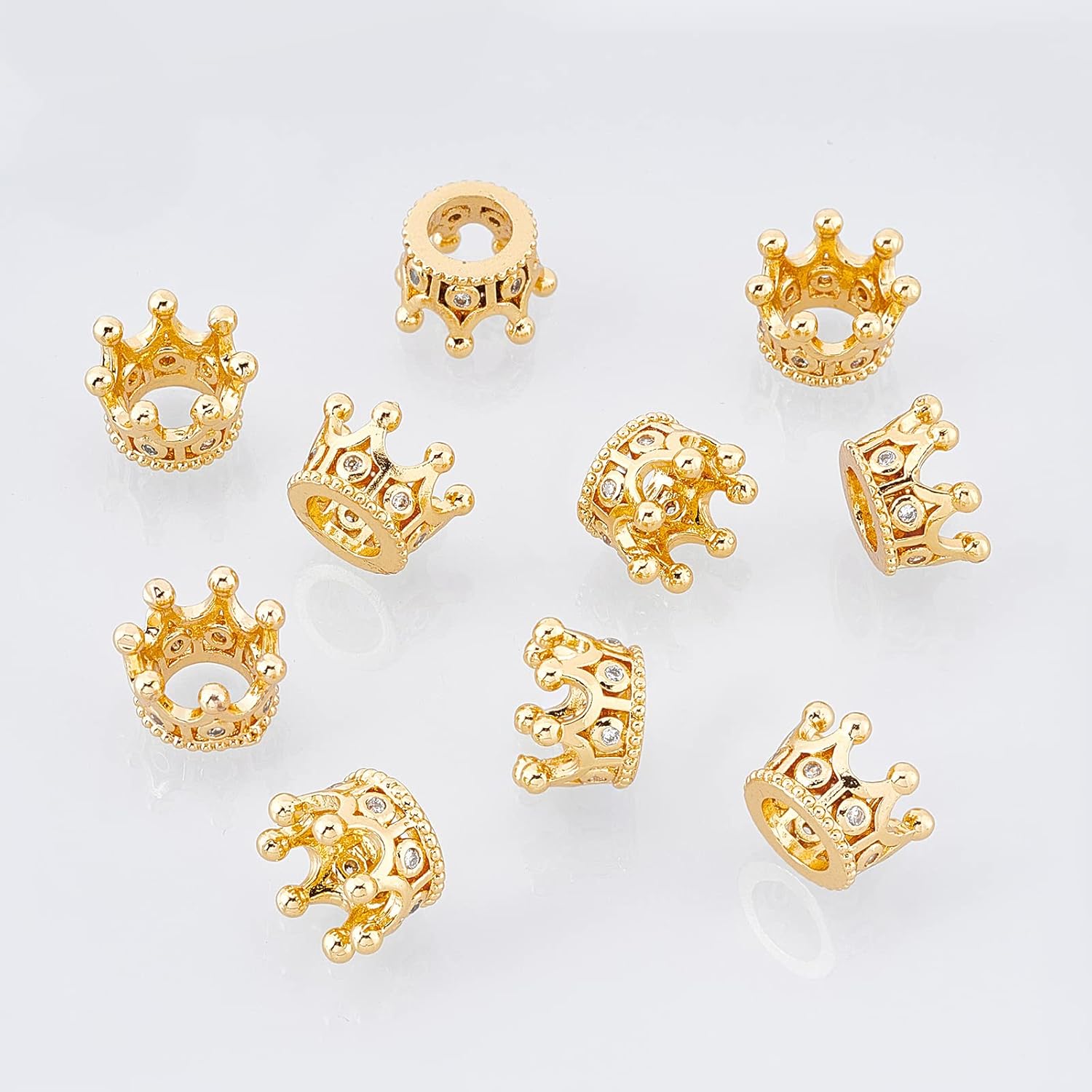 NBEADS 10 Pcs Cubic Zirconia Pave King Crown Beads, 11x7mm Golden Color Bracelet Spacer Charm Beads Large Hole Loose Beads for Bracelet Necklace DIY Golden+Clear CZ/ M
NBEADS 10 Pcs Cubic Zirconia Pave King Crown Beads, 11x7mm Golden Color Bracelet Spacer Charm Beads Large Hole Loose Beads for Bracelet Necklace DIY Golden+Clear CZ/ M