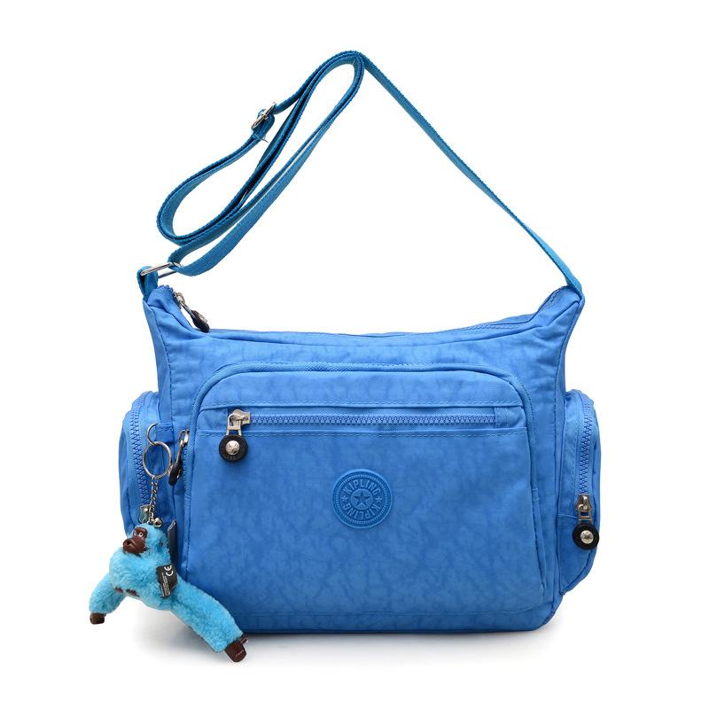 Versatile Nylon Shoulder Bag Crossbody Bag With Plush Monkey Pendant Simple Casual Large Capacity Messenger Bags
Versatile Nylon Shoulder Bag Crossbody Bag With Plush Monkey Pendant Simple Casual Large Capacity Messenger Bags