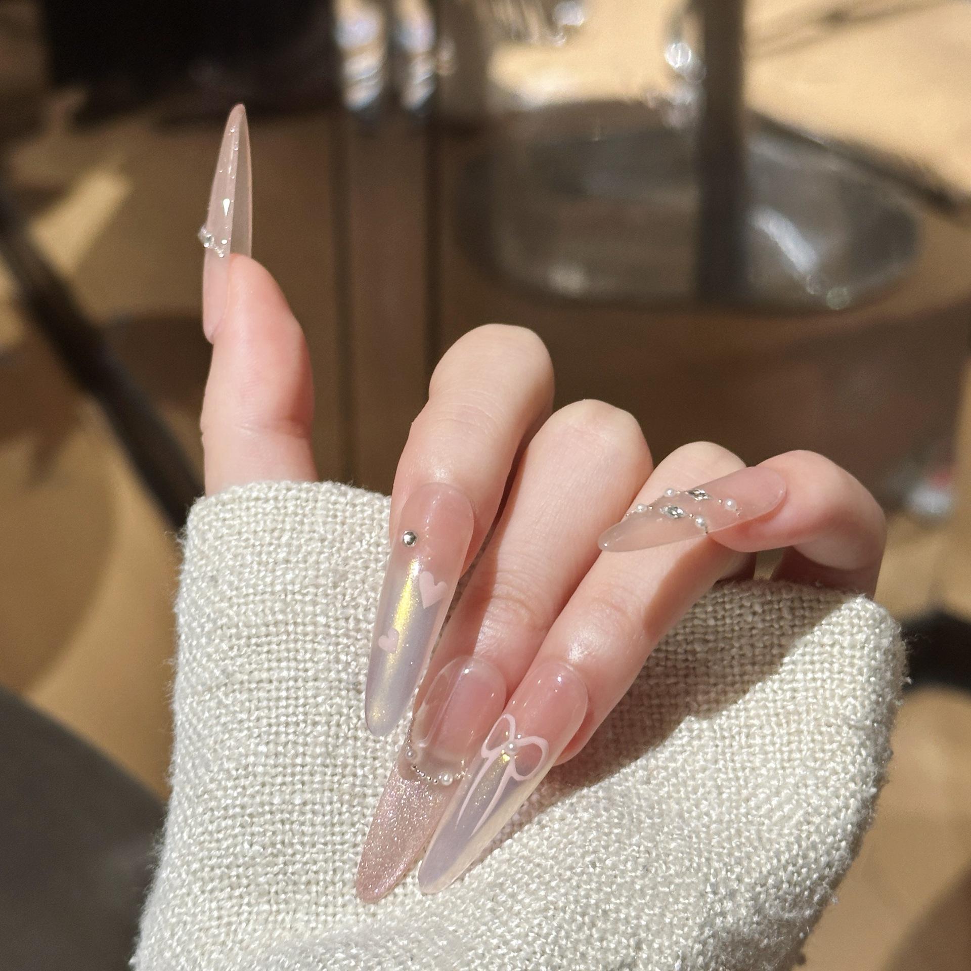 Dairenson High-End Cat Eye French Manicure with Crushed Diamond, Aurora Heart, and Bow Nail Art. Extra Small XS
Dairenson High-End Cat Eye French Manicure with Crushed Diamond, Aurora Heart, and Bow Nail Art. Extra Small XS