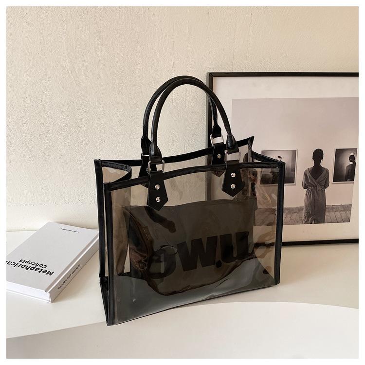 Прозрачная сумка-желе женская 2025 новая летняя большая вместительная сумка-тоут для поездок на работу универсальная зарубежная сумка через плечо