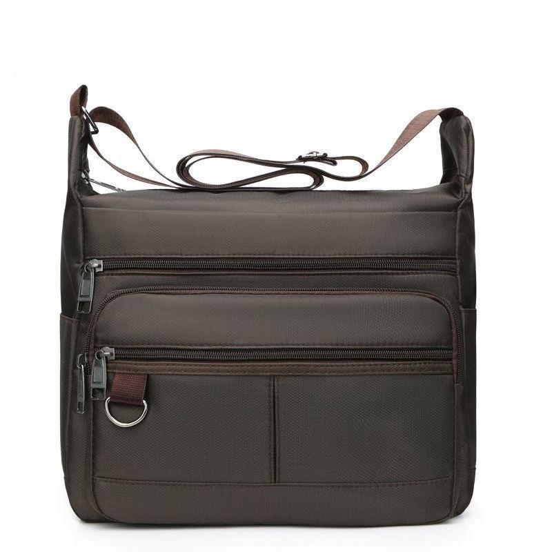 New Fashion Crossbody Bag Men s Large Capacity Shoulder Bag Casual Oxford Cloth Travel Lightweight Wear-Resistant Backpack темно-коричневого кольору
New Fashion Crossbody Bag Men s Large Capacity Shoulder Bag Casual Oxford Cloth Travel Lightweight Wear-Resistant Backpack темно-коричневого кольору