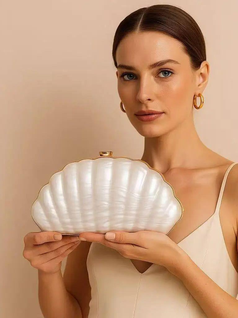 New Shell Shape Acrylic Evening Bag Pearl Texture Unique Design Wedding Banquet Party Bag High Quality Clutch Bag for Women L22xW45xH12cm белый
New Shell Shape Acrylic Evening Bag Pearl Texture Unique Design Wedding Banquet Party Bag High Quality Clutch Bag for Women L22xW45xH12cm белый