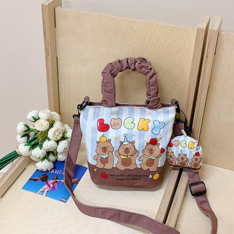 Korean Girl Canvas Water Bucket Bag With Cartoon Penguin And Bear Print Design For Everyday Fashion Style B
Korean Girl Canvas Water Bucket Bag With Cartoon Penguin And Bear Print Design For Everyday Fashion Style B