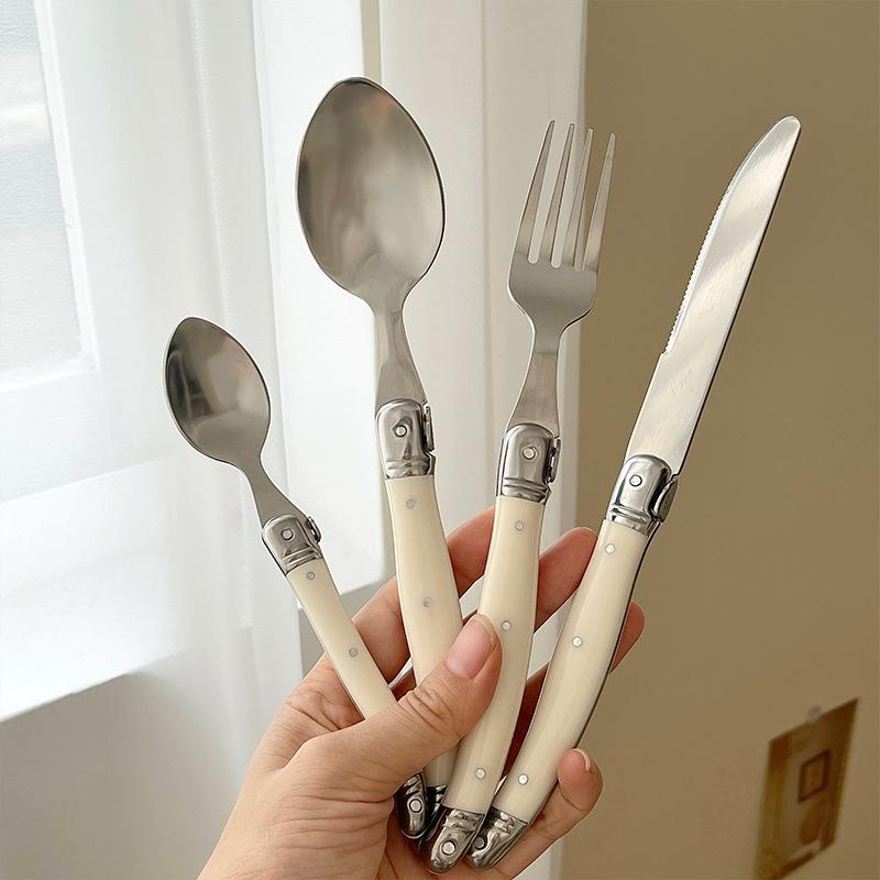 24Pcs Laguiole Cutlery Set Steak Knife Fork Soup Tea Spoon Ivory White Plastic Handle Food Grade Stainless Steel Dinnerware
24Pcs Laguiole Cutlery Set Steak Knife Fork Soup Tea Spoon Ivory White Plastic Handle Food Grade Stainless Steel Dinnerware