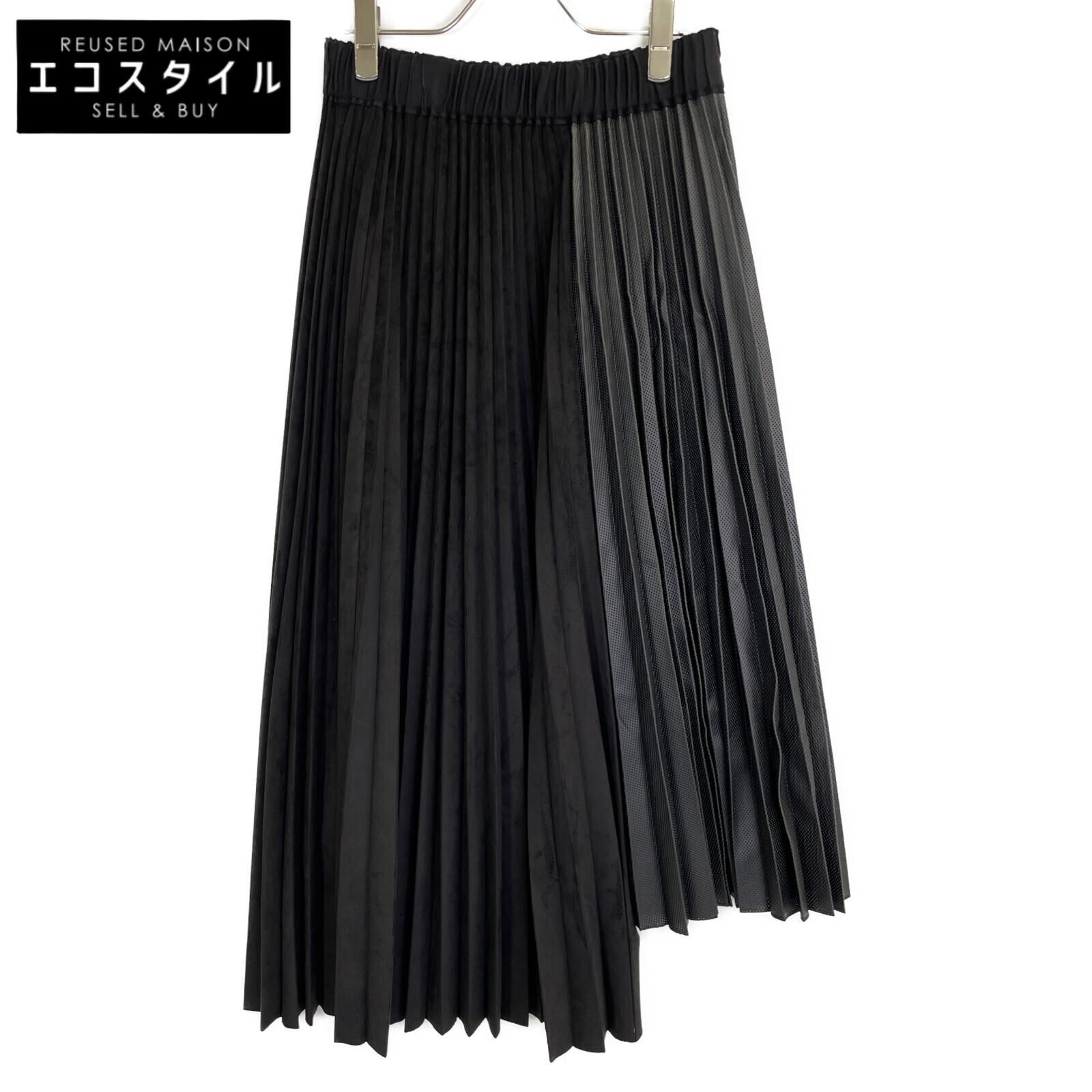 ADORE 531-9220802 Black mixed pleated asymmetrical skirt skirt 36 blackUsed
ADORE 531-9220802 Black mixed pleated asymmetrical skirt skirt 36 blackUsed