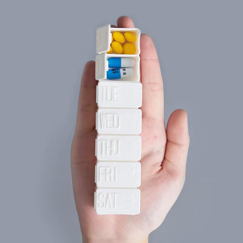 Braille 7-Compartment Portable Pill Organizer: Long Plastic Weekly Medicine Box with Printed Labels
Braille 7-Compartment Portable Pill Organizer: Long Plastic Weekly Medicine Box with Printed Labels