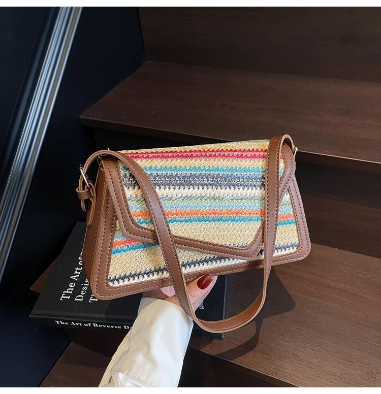 2025 Summer Personalized Knotted Contrast Striped Simple New Woven Vintage One Shoulder Armpit Crossbody Women s Bag коричневий
2025 Summer Personalized Knotted Contrast Striped Simple New Woven Vintage One Shoulder Armpit Crossbody Women s Bag коричневий