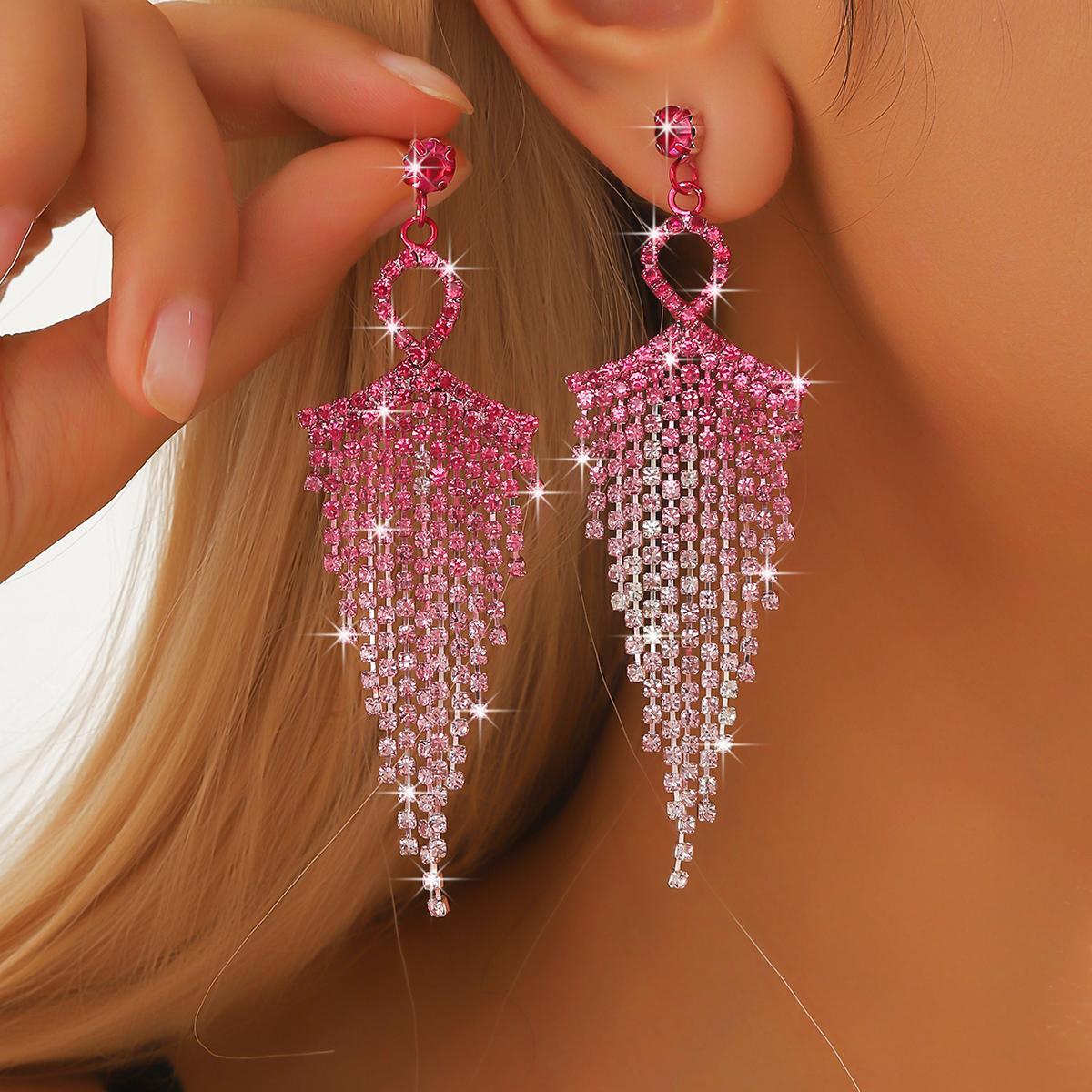 European and American gradient color full diamond tassel long earrings with high-end water diamond earrings and ear accessories
European and American gradient color full diamond tassel long earrings with high-end water diamond earrings and ear accessories